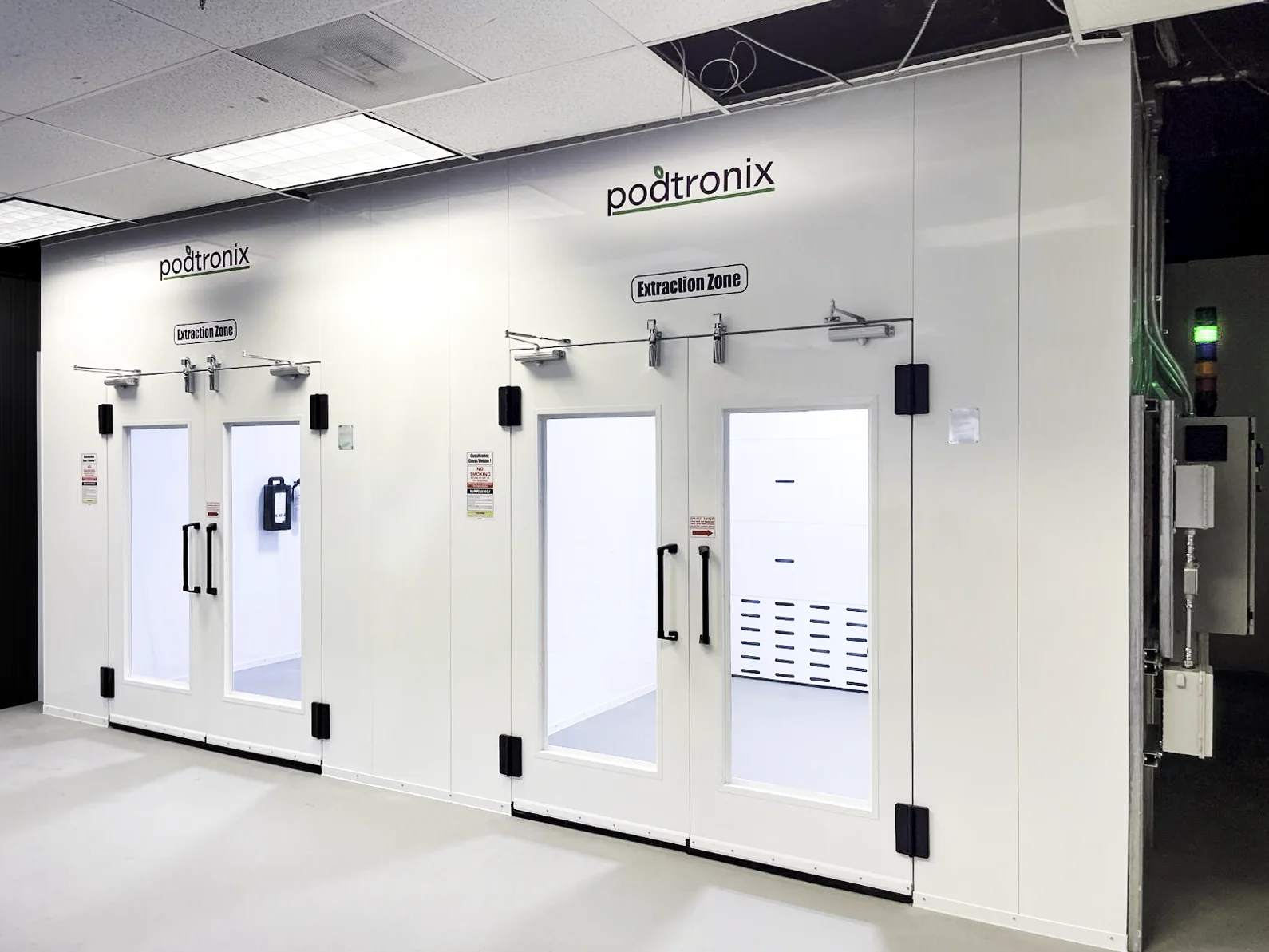 Adjacent Podtronix extraction zones with individual entry doors