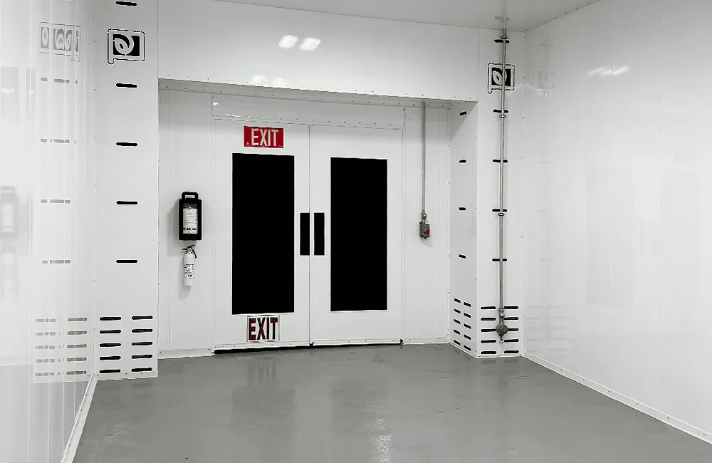 Interior exit corridor – louvered lower-plenum ventilation panels and fire extinguisher station