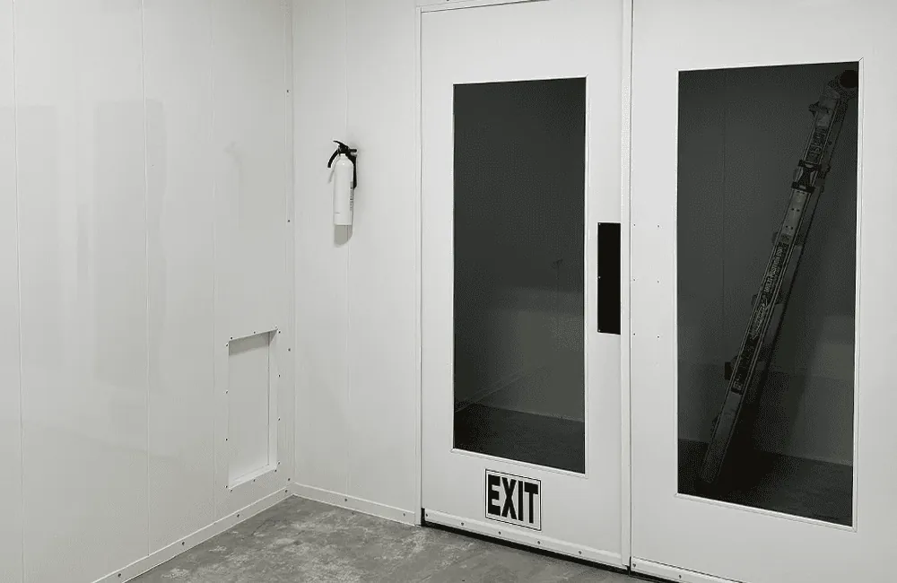 Tempered glass exit doors with fire extinguisher station