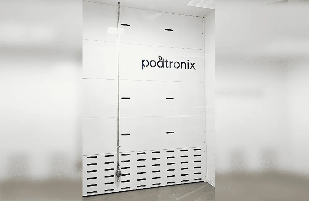 Interior vent wall – louvered base plenum with conduit riser and Podtronix branding