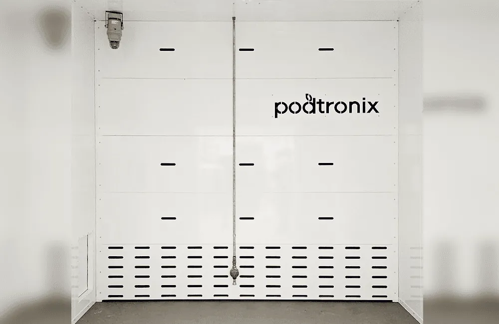Louvered lower-plenum vent wall with C1D1-rated explosion-proof fixture overhead